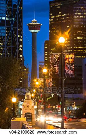 Skyscrapers, Bow Tower and Calgary Tower seen from Centre Street Bridge at night, Calgary, Alberta, Canada View Large Photo Image Stock Photo - Skyscrapers, Bow Tower and Calgary Tower seen from Centre Street Bridge at night, Calgary, Alberta, Canada. Fotosearch