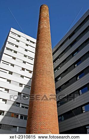 Smokestack, residential buildings, 22@, Barcelona, Catalonia, Spain View Large Photo Image Stock Photography - Smokestack, residential buildings, 22@, Barcelona, Catalonia, Spain. Fotosearch