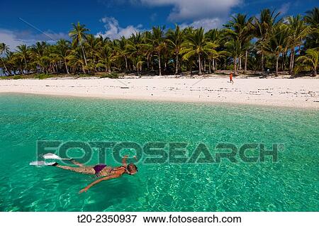 Snorkeling off Fadol Island, Kai Islands, Moluccas, Indonesia. View Large Photo Image Stock Photo - Snorkeling off Fadol Island, Kai Islands, Moluccas, Indonesia.. Fotosearch