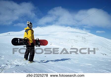 Stock Photo - Snowboarding, Hudson Bay Mountain, Smithers, British Columbia.. Fotosearch