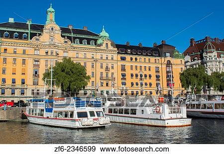 Stockholm Sweden beautiful city downtown center skyline from water with boats and buildings from cruise boat. View Large Photo Image Stock Photo - Stockholm Sweden beautiful city downtown center skyline from water with boats and buildings from cruise boat.. Fotosearch