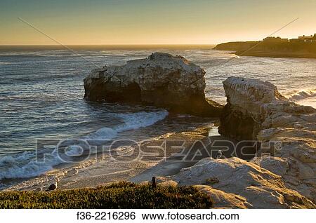 Sunset at Natural Bridges State Beach, Santa Cruz, California. View Large Photo Image Stock Photograph - Sunset at Natural Bridges State Beach, Santa Cruz, California.. Fotosearch