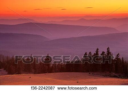 Sunset looking west over the hills from the rim of Crater Lake, Crater Lake National Park, Oregon. View Large Photo Image Stock Photo - Sunset looking west over the hills from the rim of Crater Lake, Crater Lake National Park, Oregon.. Fotosearch