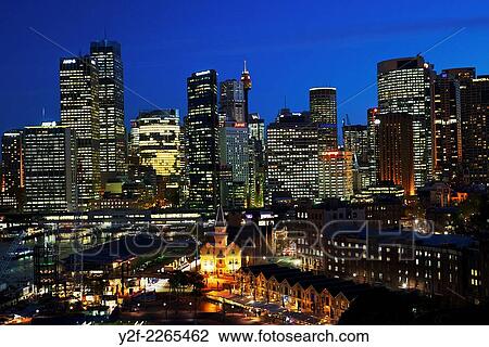 Sydney downtown skyline at dusk seen over The Rocks district. View Large Photo Image Stock Image - Sydney downtown skyline at dusk seen over The Rocks district.. Fotosearch
