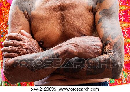 Tattooed Iban man, Mengkak Iban Longhouse, Batang Ai National Park, Sarawak, Malaysian Borneo, Malaysia, Southeast Asia, Asia,. View Large Photo Image Stock Photography - Tattooed Iban man, Mengkak Iban Longhouse, Batang Ai National Park, Sarawak, Malaysian Borneo, Malaysia, Southeast Asia, Asia,.. Fotosearch
