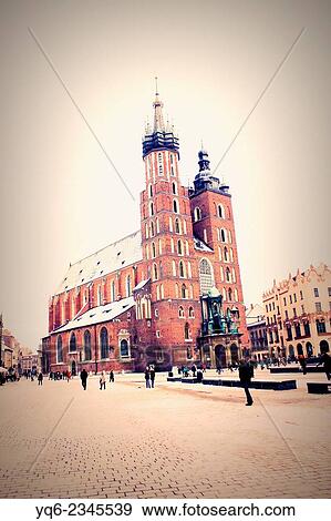 The Main Market Square and St Mary's Church in Krakow, Poland. View Large Photo Image Stock Photo - The Main Market Square and St Mary's Church in Krakow, Poland.. Fotosearch