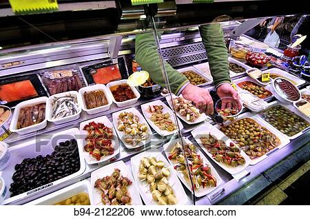 The Mercat de Sant Josep de la Boqueria, aka La Boqueria, large public market with an entrance from La Rambla, not far from the Liceu, Barcelona's opera house. Ciutat Vella district of Barcelona, Catalonia, Spain View Large Photo Image Stock Photograph - The Mercat de Sant Josep de la Boqueria, aka La Boqueria, large public market with an entrance from La Rambla, not far from the Liceu, Barcelona's opera house. Ciutat Vella district of Barcelona, Catalonia, Spain. Fotosearch