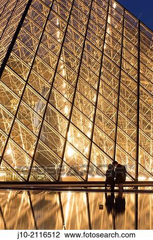 Stock Image - The Pyramid entry, Louvre Museum, (architect = I M Pei), Paris, France.. Fotosearch