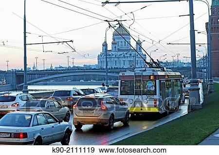 Traffic jam along the road on the embankment aside of the Kremlin walls with the Cathedral of Christ the Savior's in the background, Moscow, Russia, Europe. View Large Photo Image Stock Photo - Traffic jam along the road on the embankment aside of the Kremlin walls with the Cathedral of Christ the Savior's in the background, Moscow, Russia, Europe.. Fotosearch