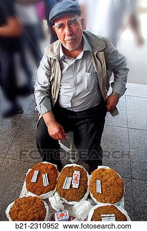 Turkey. Istanbul. Cigarettes man under the Galata Bridge. View Large Photo Image Stock Image - Turkey. Istanbul. Cigarettes man under the Galata Bridge.. Fotosearch