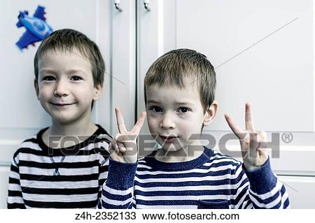 Twins brothers. View Large Photo Image Stock Image - Twins brothers.. Fotosearch
