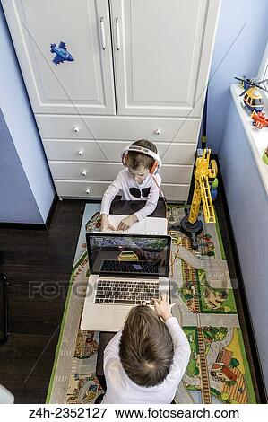 Stock Photo - Twins brothers.. Fotosearch