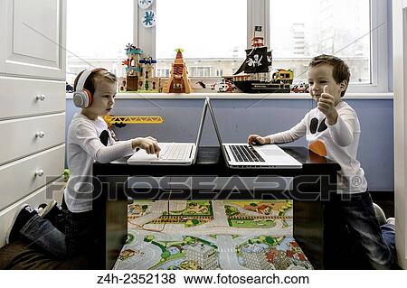 Stock Photo - Twins brothers.. Fotosearch