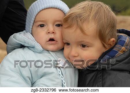 Stock Photograph - Two baby boys, Madrid, Spain. Fotosearch
