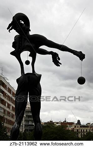 Stock Image - View of a metalic ball of a sculpture in the Congress Palace Square, Madrid, Spain.. Fotosearch
