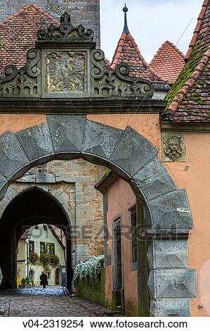 Picture - View through the Burgtor (Castle Gate) with timbered houses in the background, Rothenburg ob der Tauber, Bavaria, Germany, Europe. Fotosearch