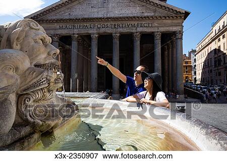 Visiting the Roman Pantheon in Rome Italy. View Large Photo Image Stock Photo - Visiting the Roman Pantheon in Rome Italy.. Fotosearch