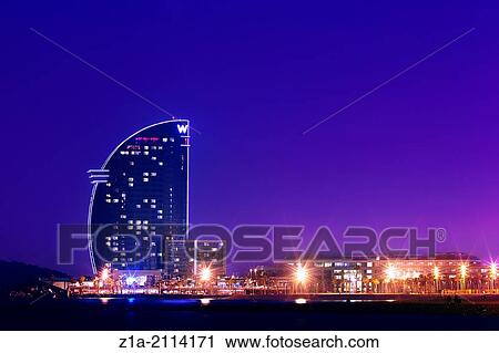 Stock Image - W Barcelona, also knowm as Hotel Vela (Sail hotel), designed by architect Ricardo Bofill. Barcelona. Catalunya. Spain.. Fotosearch