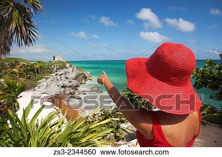 Woman posing at Tulum Ruins, Quintana Roo, Yucatan Province, Mexico, Central America. View Large Photo Image Stock Image - Woman posing at Tulum Ruins, Quintana Roo, Yucatan Province, Mexico, Central America.. Fotosearch