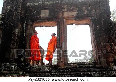 Young monks in Bayon Temple, Angkor, Siem Reap. Cambodia View Large Photo Image Stock Photography - Young monks in Bayon Temple, Angkor, Siem Reap. Cambodia. Fotosearch
