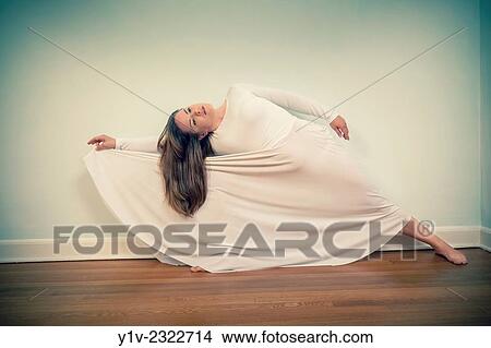 Picture - Young woman dancing.. Fotosearch