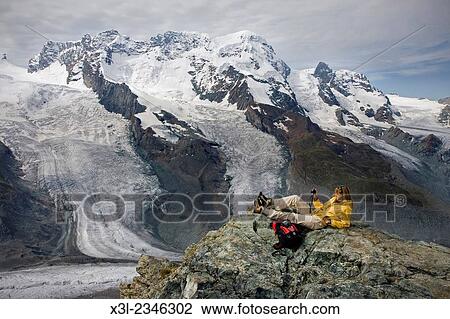 Stock Image - Young woman in Gornetgrat glacier. Switzerland.. Fotosearch