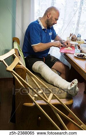 A man with a foot injury. View Large Photo Image Stock Photography - A man with a foot injury.. Fotosearch