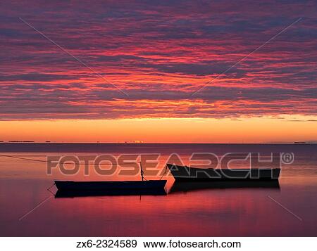 Stock Photo - "Alfacs Bay at dawn. Ebro River Delta Natural Park, Tarragona province, Catalonia, Spain. ". Fotosearch