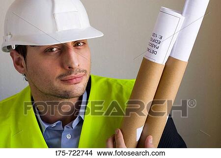 Architect with blueprints View Large Photo Image Picture - Architect with blueprints. Fotosearch