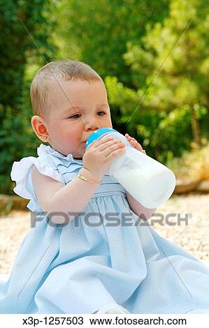 Stock Image - Baby eating. Fotosearch
