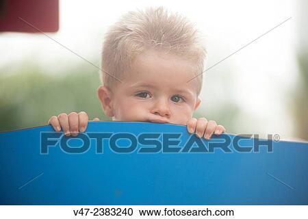Baby playing hide View Large Photo Image Stock Image - Baby playing hide. Fotosearch