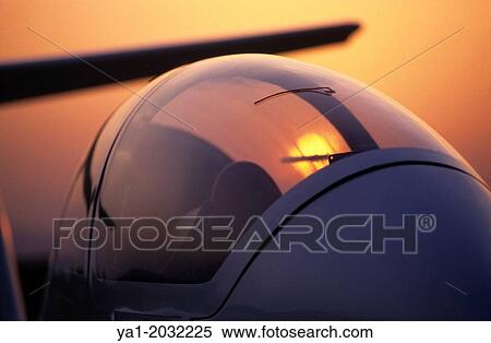 "Canopy of glider plane Twin Astir on sunset, Santa Cilia de Jaca aerodrome, Aragon, Spain. " View Large Photo Image Stock Photography - "Canopy of glider plane Twin Astir on sunset, Santa Cilia de Jaca aerodrome, Aragon, Spain. ". Fotosearch