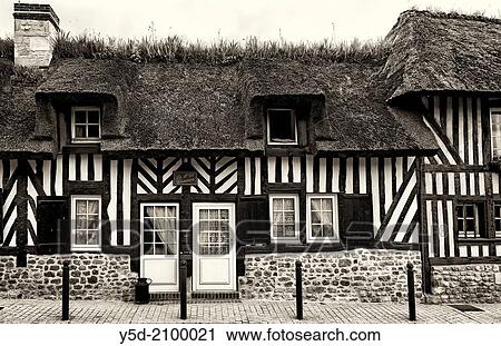 "characteristic traditional architecture of Normandy, cottage with thatched roof, France,." View Large Photo Image Stock Image - "characteristic traditional architecture of Normandy, cottage with thatched roof, France,.". Fotosearch
