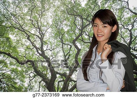 Stock Photo - "Chinese woman, Hong Kong, China". Fotosearch