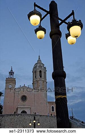 "Church of Sant Bartomeu i Santa Tecla at sunset, Sitges, Catalonia, Spain" View Large Photo Image Stock Image - "Church of Sant Bartomeu i Santa Tecla at sunset, Sitges, Catalonia, Spain". Fotosearch