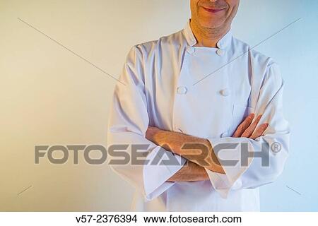 "Cook smiling, crossing arms. " View Large Photo Image Picture - "Cook smiling, crossing arms. ". Fotosearch