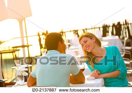 Couple in outdoor restaurant View Large Photo Image Stock Photo - Couple in outdoor restaurant. Fotosearch