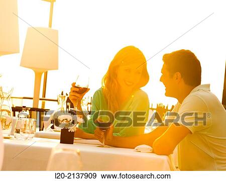 Couple in outdoor restaurant View Large Photo Image Stock Photo - Couple in outdoor restaurant. Fotosearch