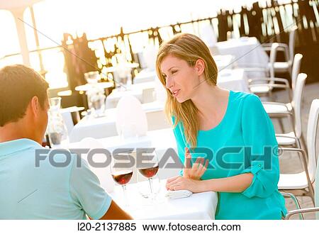 Couple in outdoor restaurant View Large Photo Image Stock Photography - Couple in outdoor restaurant. Fotosearch