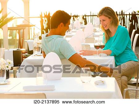 Couple in outdoor restaurant View Large Photo Image Stock Photography - Couple in outdoor restaurant. Fotosearch