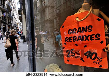 Picture - "Discounts in a clothes store in Barcelona, Catalonia, Spain". Fotosearch