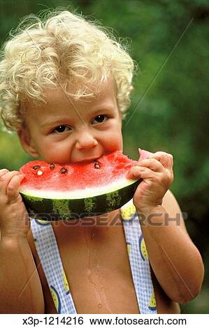 Eating watermelon View Large Photo Image Stock Photograph - Eating watermelon. Fotosearch
