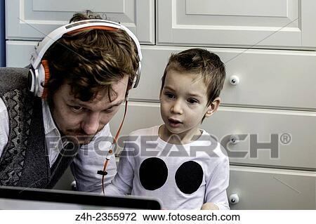Stock Image - Father and son.. Fotosearch