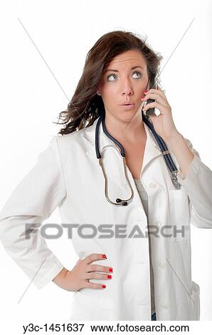 Female Doctor in white lab coat with stethoscope View Large Photo Image Stock Photo - Female Doctor in white lab coat with stethoscope. Fotosearch