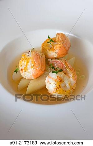 "French Polynesia, Leeward archipelago, Bora Bora island, Luxury Hotel resort Saint-Regis, Cuisine by chef Romuald Feger at restaurant Te Pahu" View Large Photo Image Stock Photo - "French Polynesia, Leeward archipelago, Bora Bora island, Luxury Hotel resort Saint-Regis, Cuisine by chef Romuald Feger at restaurant Te Pahu". Fotosearch