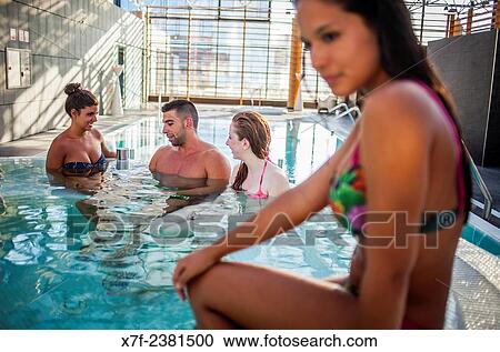 Stock Image - "Friends in thalassotherapy center Casa del Agua, Termaria, Calle Manuel Murguía, Coruña city, Galicia, Spain. ". Fotosearch