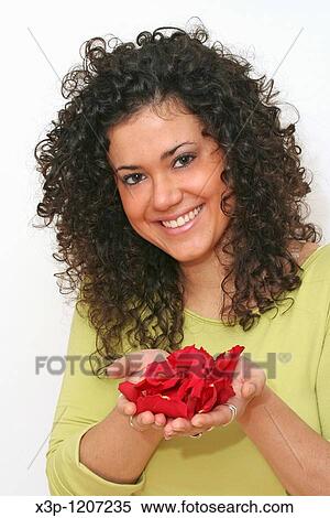 Girl and rose petals View Large Photo Image Stock Photography - Girl and rose petals. Fotosearch
