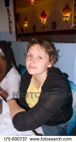 Stock Photo - Girl in a pub.. Fotosearch