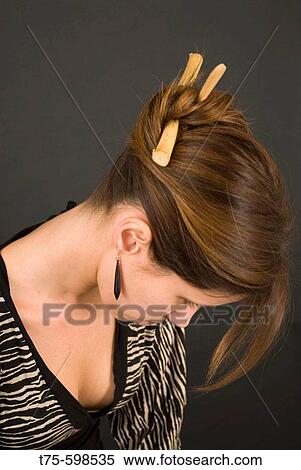 Stock Photography - Girl with a hairstyle.. Fotosearch