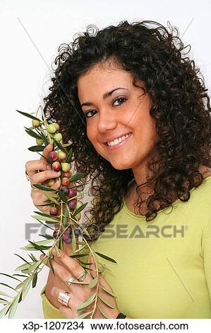 Girl with olives branch View Large Photo Image Picture - Girl with olives branch. Fotosearch